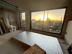 Dormer loft room boarded out, with the large window in and floor insulation going down